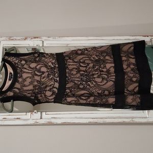 Nude lined black lace dress